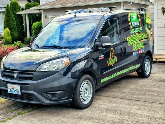A wrapped van parked at a home